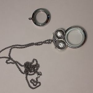 Two floating pendant lockets